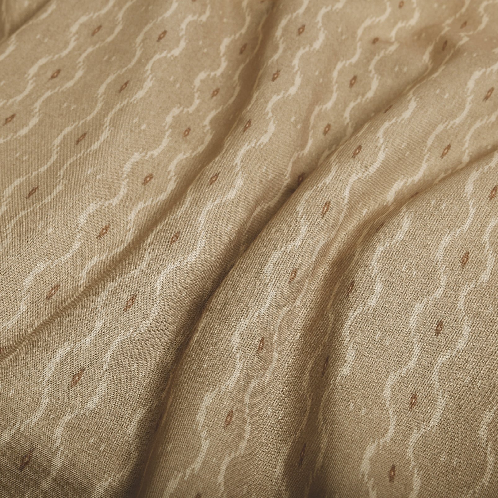 Rustic Ikat Toast Light Filtering Roller Blind fabric close up image