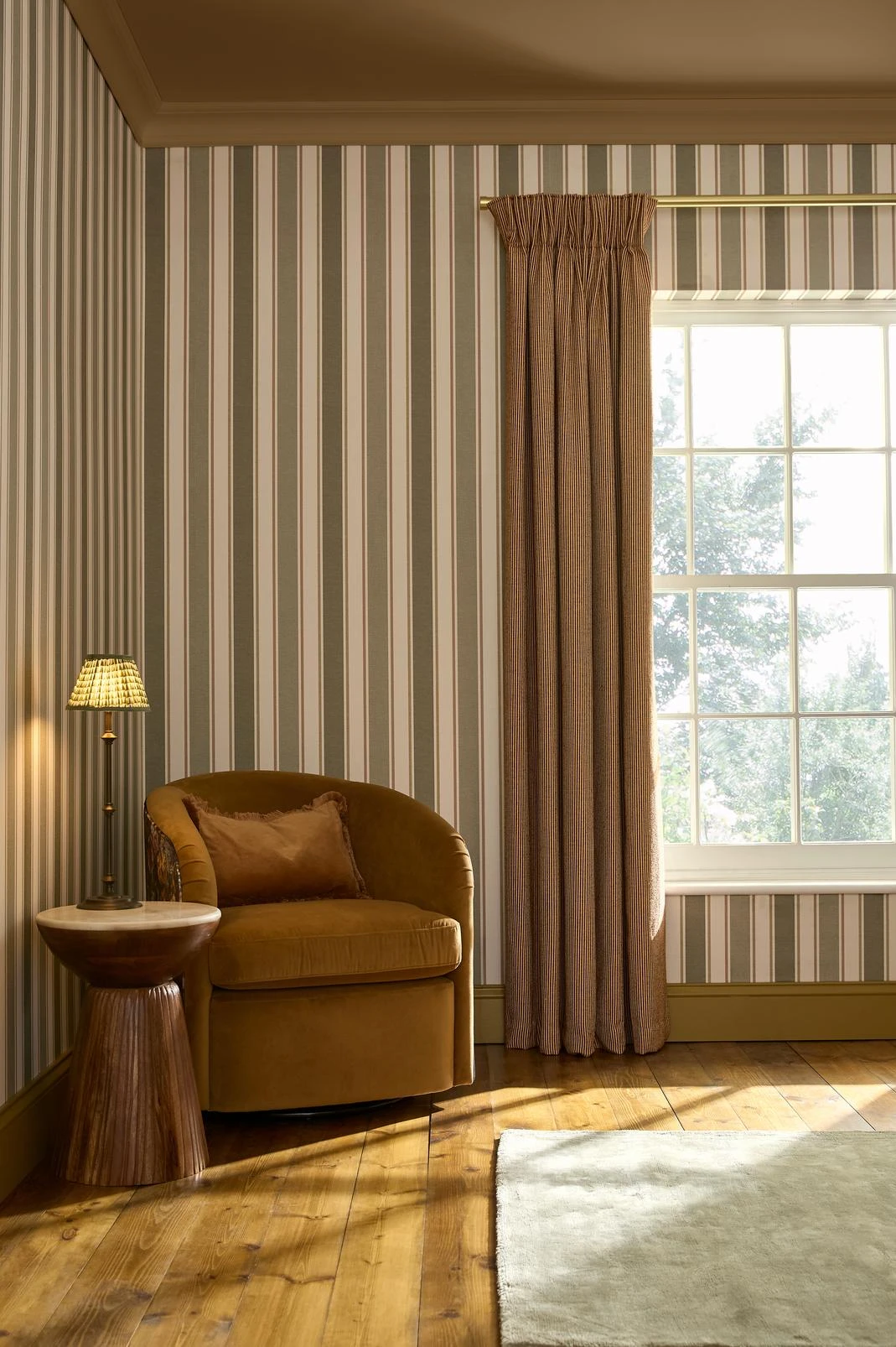 Foundry Stripe Forest Wallpaper - 146390_ROOMSET_02_FoundryStripForest_AmberEarth_cur_RidgeLoomSienna_G&BRug_G&BChair_2.jpg